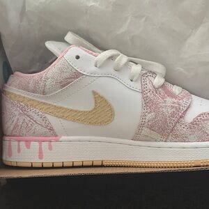 Jordan Pink and Gold Sneakers with Metallic Accents